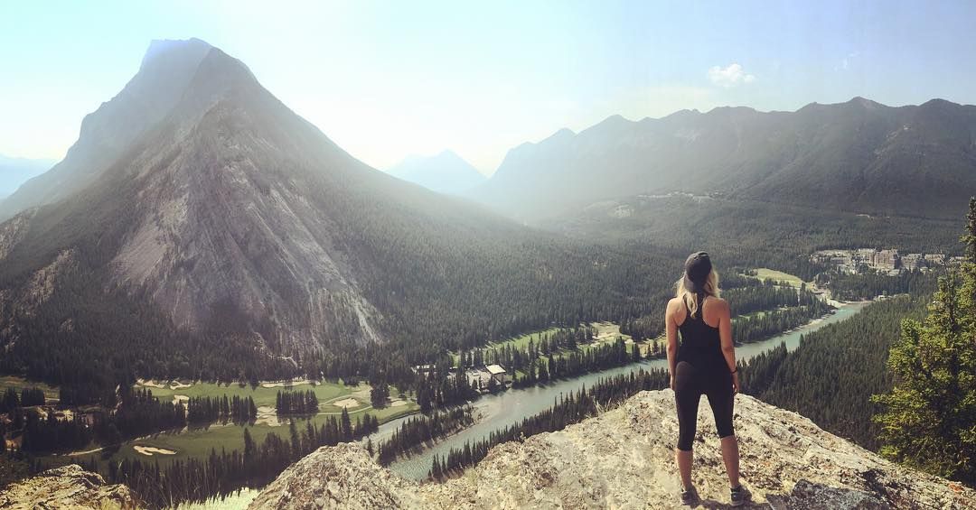 Hiker on the overlook to Banff, Banff National Park, Alberta, Canada