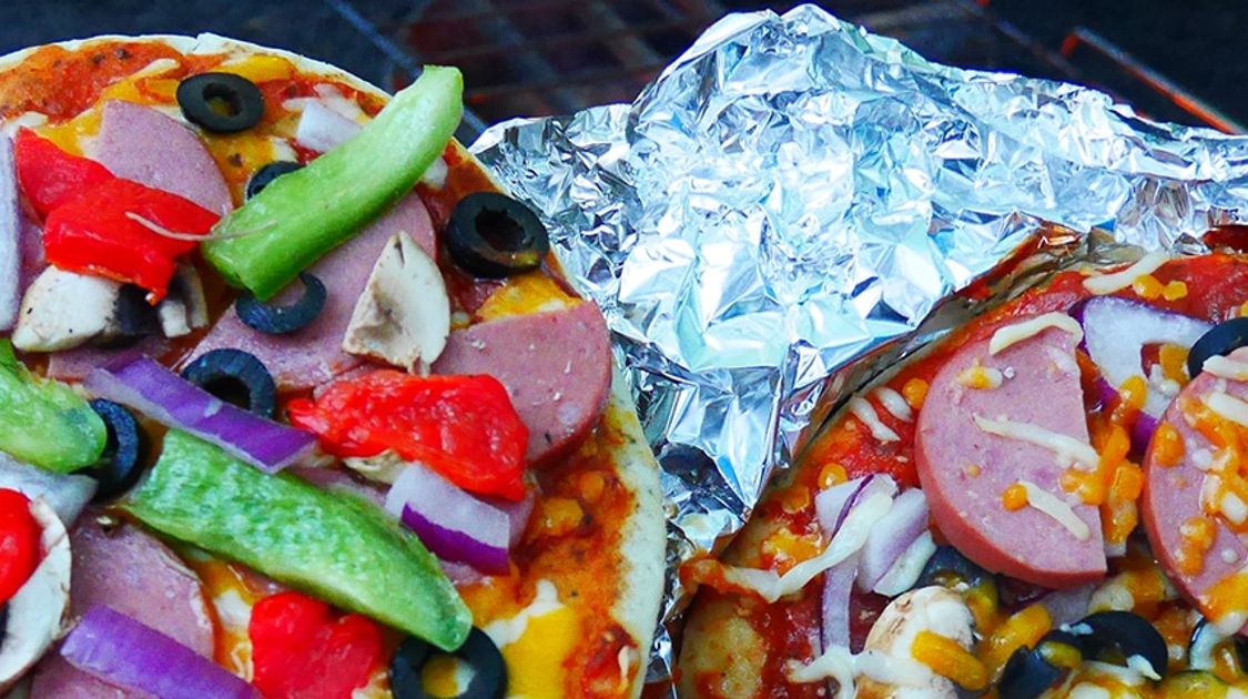 Pizza cooked on firepit using backcountry cooking tips