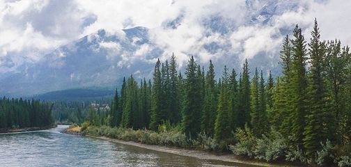 Main Street, Bow River and the Rail Bridge in Canmore, the Canadian Rockies