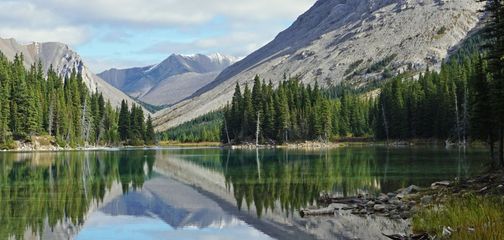 Panoramic view of beautiful Elbow Lake in Banff National Park