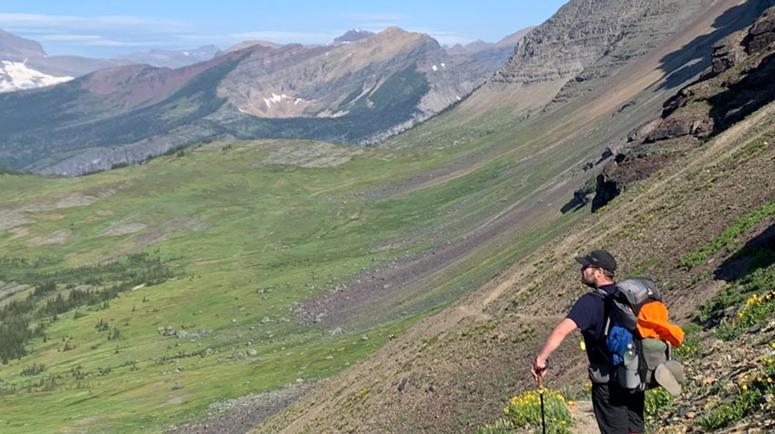 Hiker reviewing Granite Gear Crown 60 Backpack